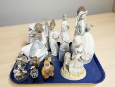 A group Nao, Lladro and other Spanish figures and groups, six resin figures of sailors,