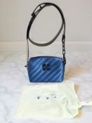 An Italian Off-White Jackhammer camera bag in nylo-blue,