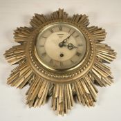 A Smiths eight day gilt sunburst wall timepiece, diameter 30 cm.