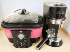 A De'Longhi coffee machine and a JML air fryer.