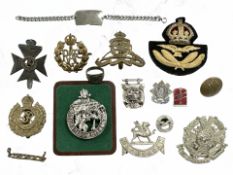 A group of military insignia and cap badges, Royal Engineers, RAF, The King's Royal Rifle Corps,