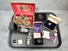 Assorted costume jewellery including a silver pendant, gold plated items, wristwatches,