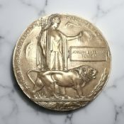 A World War I bronze death penny, named to 21/88 PTE. Joseph B.