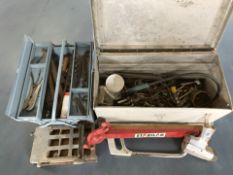 Two metal toolboxes containing assorted hand tools.