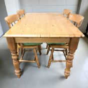 A modern pine farmhouse style kitchen table,