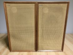 A pair of Bowers & Wilkins teak cased speakers, height 72 cm.