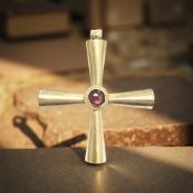 A fine Byzantine Empire gold cross/crucifix with set with a cabochon garnet,