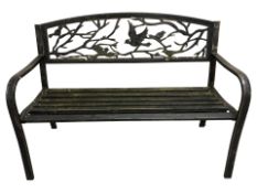 A painted metal garden bench, width 125 cm.