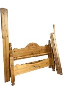 A contemporary pine double bed frame