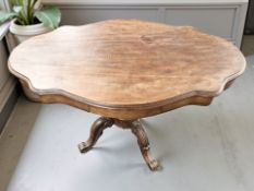 A Victorian mahogany shaped topped occasional table, fitted two drawers,