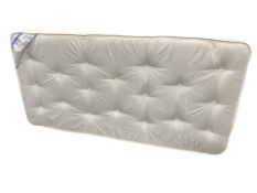 A Optimum Sleep Enzo 3' mattress.