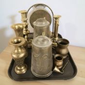 A brass dinner gong, a candlestick, an ejector candlestick,
