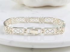 A fancy link silver bracelet, length 18cm CONDITION REPORT: 15.