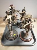 Four reproduction patinated metal Franklin Mint Native American figures.