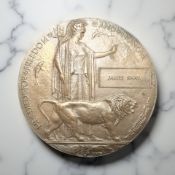 A World War I bronze death penny, named to James Shaw.