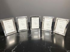 A set of five silver easel photo frames, Haviland, London, height 19cm.