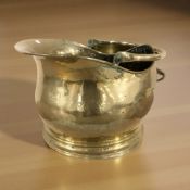 A Victorian brass coal helmet.