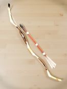 A recurve bow and a bundle of arrows.