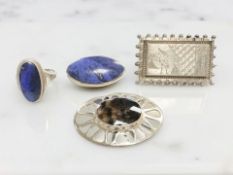 A silver lapis lazuli ring, similar oval brooch, a Blue John brooch, Sheffield 1973,