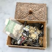 A collection of cap badges, insignia, military buttons, etc.