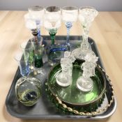 A group of etched and coloured hock glasses, a further set of four smaller glasses, paperweights,