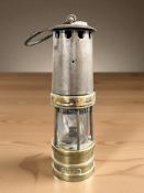 A 19th century brass and steel miner's lamp,