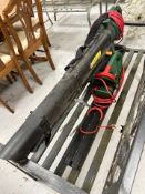 A Qualcast electric hedge trimmer, garden fork and a further electric leaf blower.