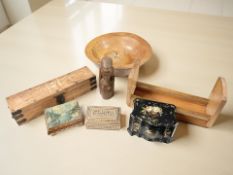 A Victorian papier maché serpentine front tea caddy together with two wooden trinket boxes, bowl,