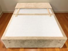 A 4ft 6 storage divan base with headboard.