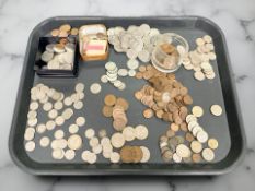 A large group of British coins including two pound coins, one pound coins, twenty pence coins,