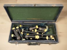 An early 20th century Scottish set of African blackwood bagpipes, with ivory mounts,