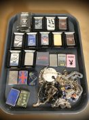 A collection of Zippo lighters, some in original boxes,