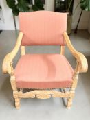 A continental heavily carved oak armchair