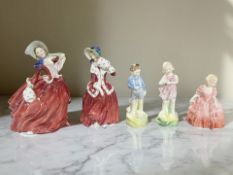Five Royal Doulton figures : Autumn Breezes HN 1934, Christmas Morn HN 1992, He Loves Me HN 2046,