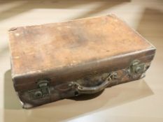 An early 20th century brown stitched leather suitcase, initialled 'GFP'.
