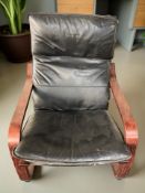 A Scandinavian stained bentwood and black leather lounge chair
