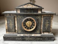A Victorian black slate and marble eight day mantel clock, width 43 cm.