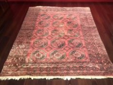 A Turkoman carpet, Afghanistan, 312 cm x 253 cm.