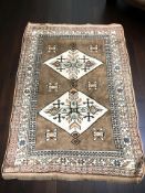 An Iranian Gabbeh rug, 191 cm x 135 cm.