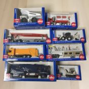 Eight Siku 1:87 and 1:50 scale die cast models including construction, haulage wagons, etc,