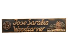 A painted wooden sign 