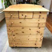 A contemporary pine seven drawer chest, 96 cm x 51 cm x 113 cm.