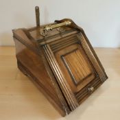 A Victorian walnut coal receiver, length 51 cm.