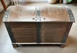 A 19th century continental oak and metal bound domed blanket chest, width 104 cm.