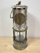 A chrome and brass Eccles type GR6 miner's safety lamp.