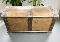 A 19th century continental oak and metal bound domed blanket chest, width 106 cm.
