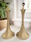 A pair of contemporary gilt metal lamp bases, height 65 cm.