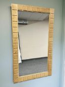 A continental blonde oak rectangular mirror, 121 cm x 73 cm.