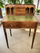A reproduction inlaid mahogany lady's writing table, 63 cm x 45 cm x 97 cm.
