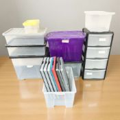 A collection of plastic storage boxes with lids, largest 60 cm wide.